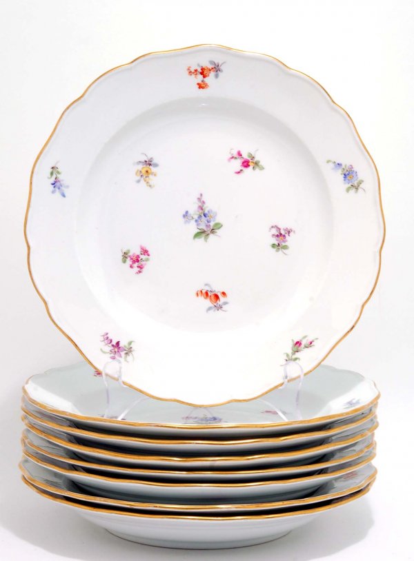 Appraisal: Eight Meissen deep plates Handpainted with sprigs of flowers Scalloped