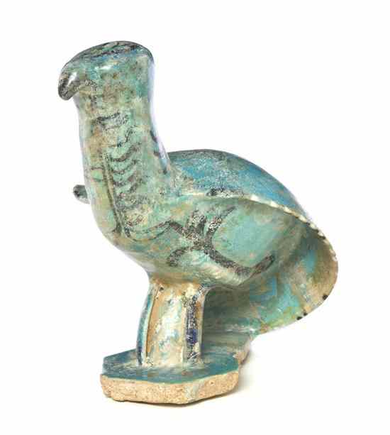 Appraisal: A Middle Eastern Turquoise Glaze Pottery Animalier Figure depicting a