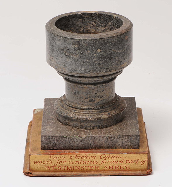 Appraisal: AN ANTIQUE MINIATURE TURNED STONE FONT on a square pedestal