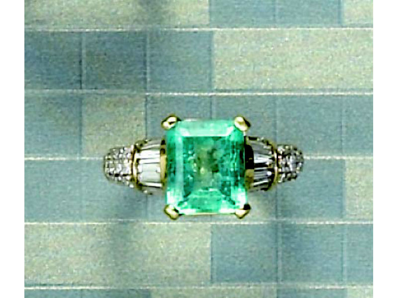 Appraisal: EMERALD AND DIAMOND RING k yellow gold lady's ring set