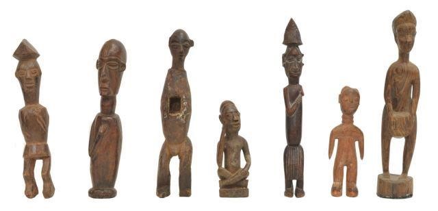 Appraisal: lot of African tribal carved hardwood figures one seated figure