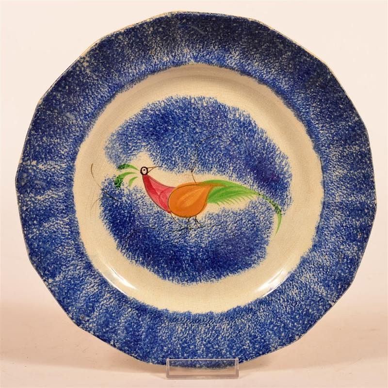 Appraisal: Blue Spatter Ironstone Peafow Paneled Plate Blue Spatter Ironstone China