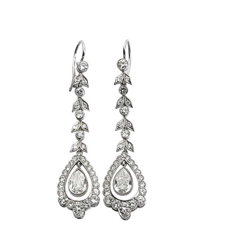 Appraisal: DIAMOND AND PLATINUM GARLAND STYLE EARRINGS Bellflower links suspend pear