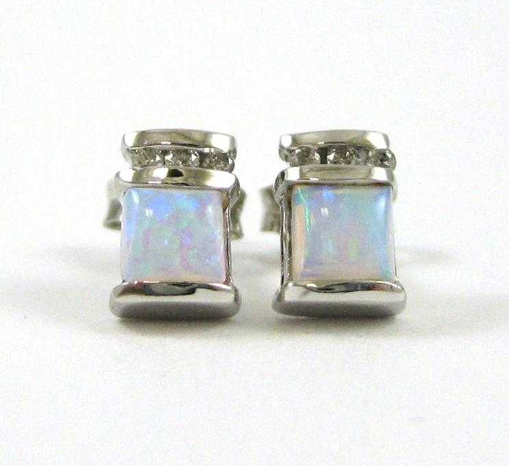 Appraisal: PAIR OF OPAL AND DIAMOND EARRINGS each k white gold