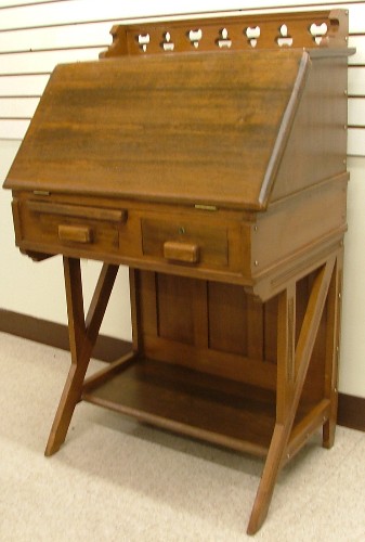 Appraisal: VICTORIAN WALNUT SLANT-FRONT WRITING DESK American Eastlake Gothic influence late