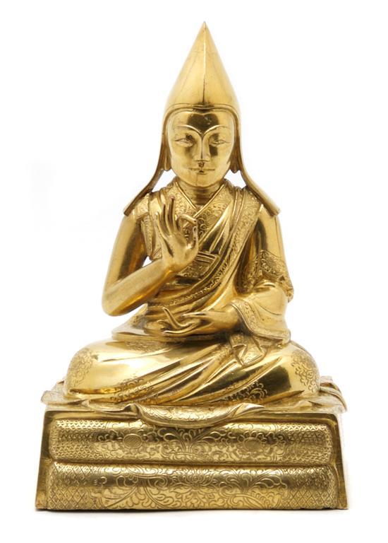 Appraisal: Sino-Tibetan Gilt Bronze Seated Figure of a Lama th century