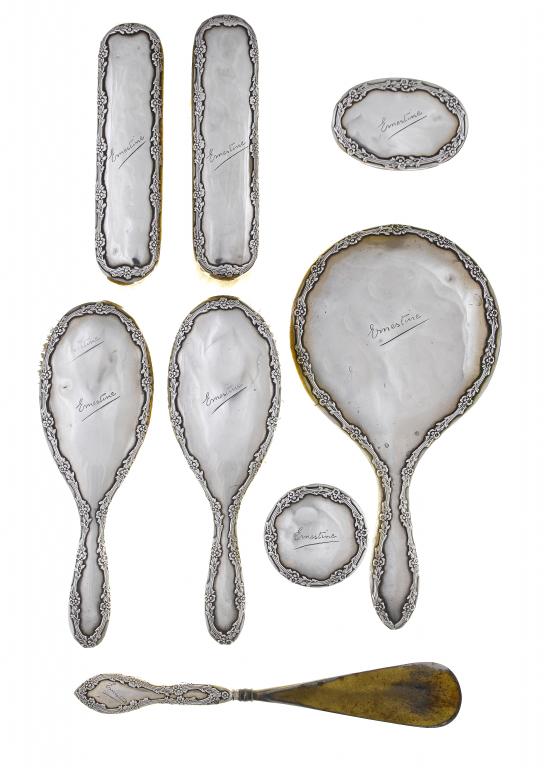 Appraisal: AN EDWARD VII DRESSING TABLE SET embossed with entwined floral