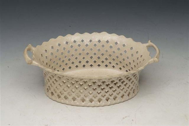 Appraisal: A STAFFORDSHIRE STONE WARE BASKET circa across