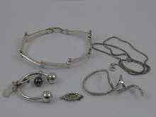 Appraisal: A mixed lot comprising white metal tests silver articulated bracelet