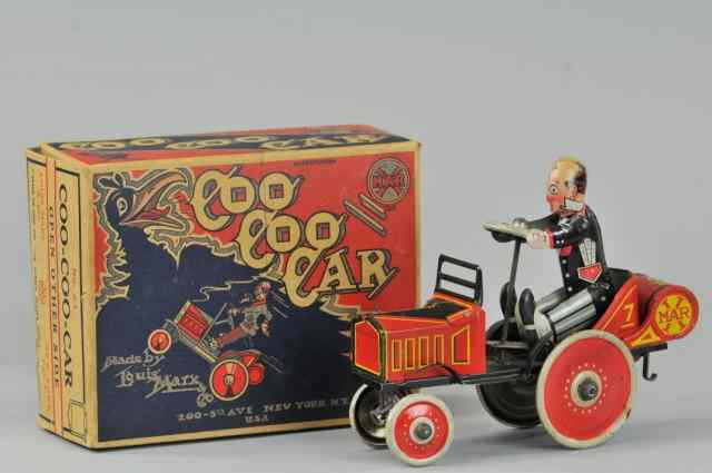 Appraisal: COO COO CAR WITH ORIGINAL BOX Louis Marx Co lithographed