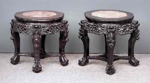 Appraisal: Two Chinese blackwood circular jardiniere stands of shaped outline the