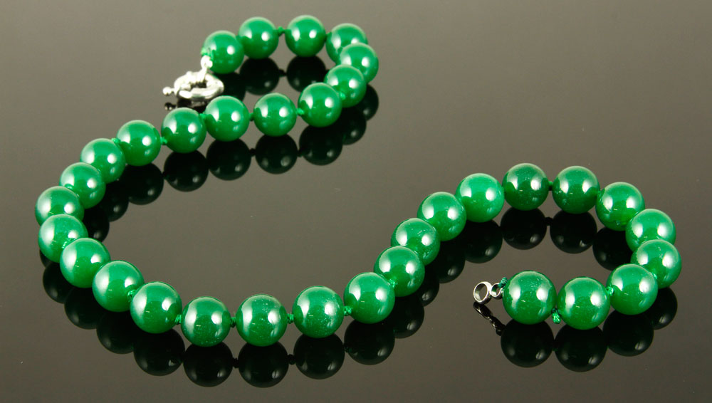 Appraisal: - Fine Jade Glass Necklace Fine dark jade glass necklace