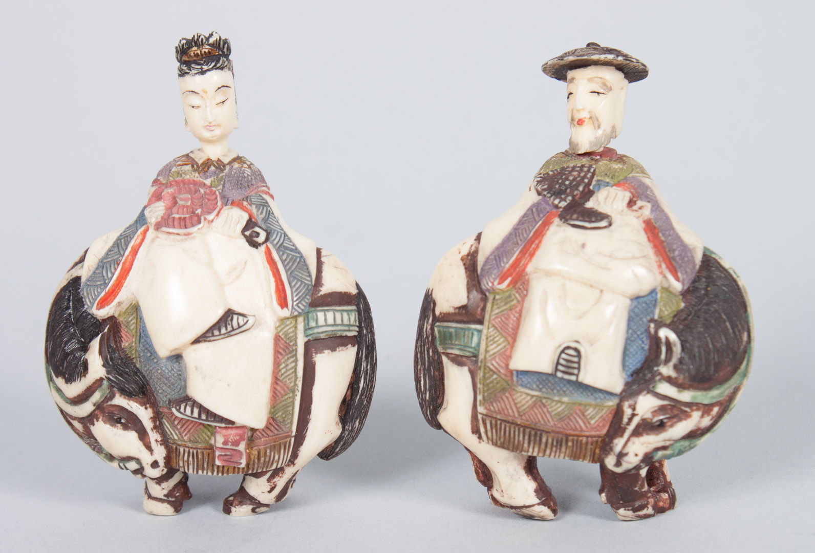 Appraisal: Pair of Chinese carved ivory snuff bottles each modeled as