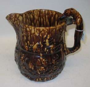 Appraisal: AN AMERICAN BENNINGTON BROWNWARE PITCHER th C of Bennington Vt