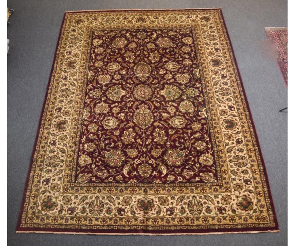 Appraisal: Palace size Agra carpet with maroon field leafy flowers and