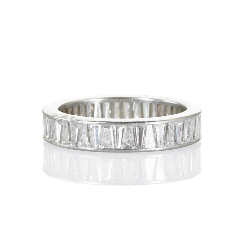 Appraisal: CARTIER DIAMOND PLATINUM ETERNITY BAND Precise dovetailed channel of tapered