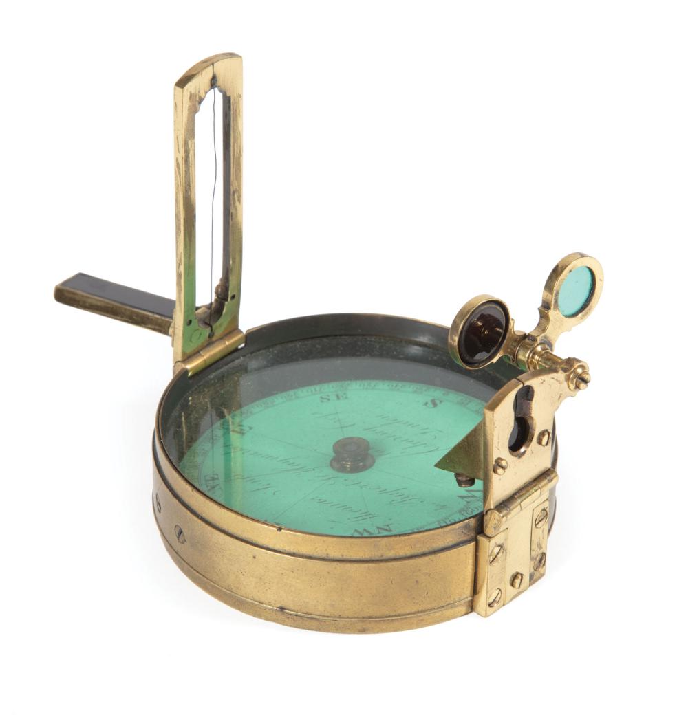 Appraisal: English Brass Prismatic Compass c floating dry card marked Thomas