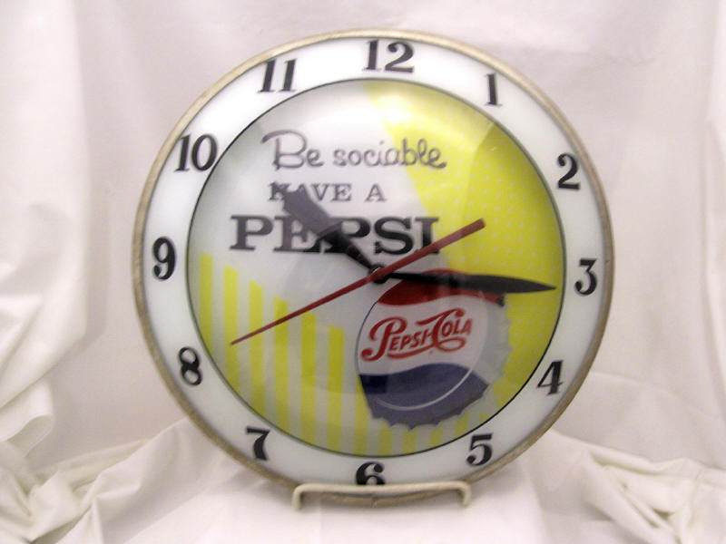 Appraisal: Pepsi Bubble Face Clock Bubble face clock White background with