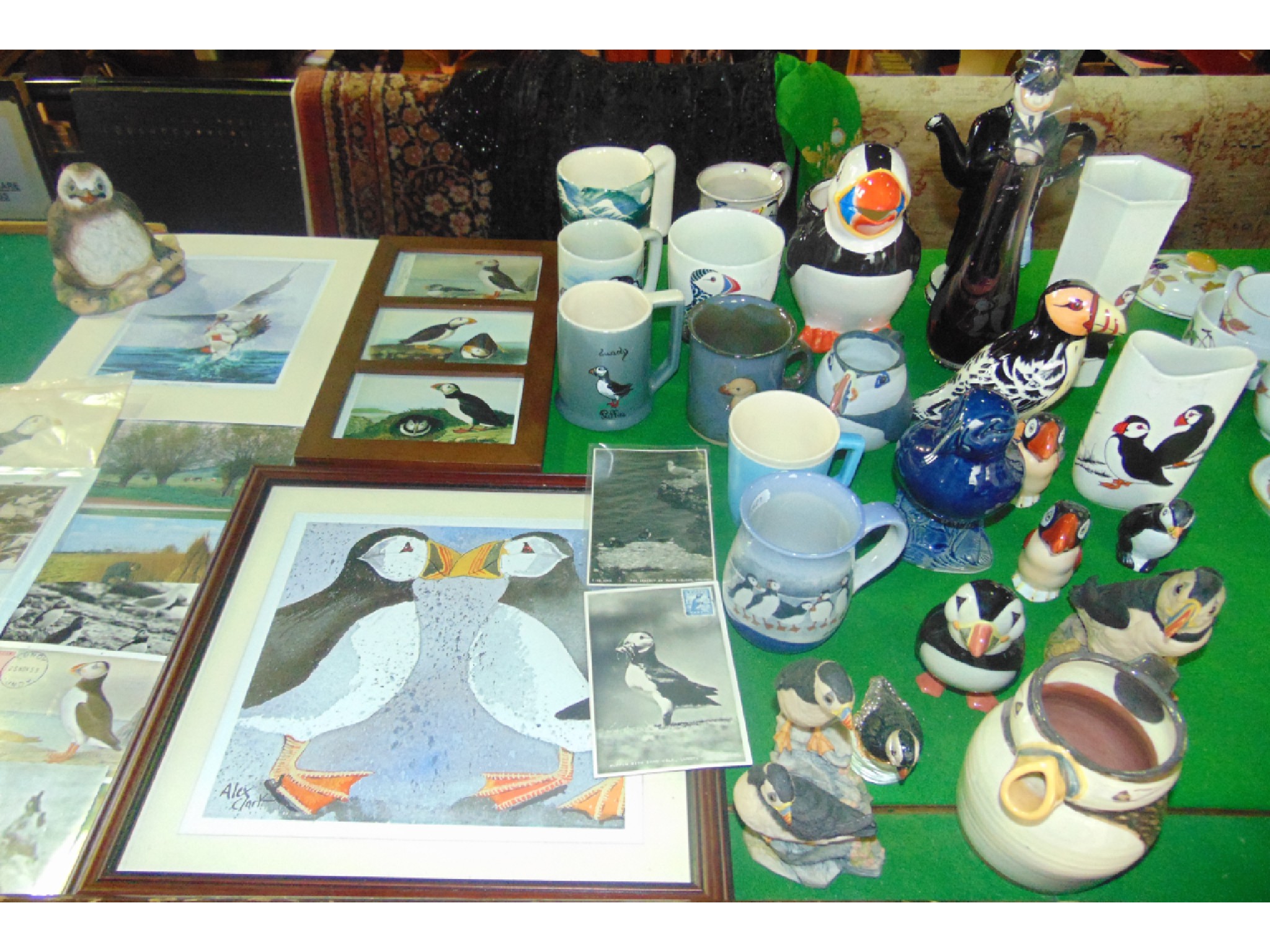 Appraisal: Displayed on green baize A collection of puffin related wares