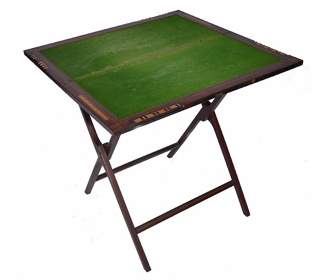 Appraisal: AN EDWARDIAN MAHOGANY COACHING GAMES TABLE with inset green baize