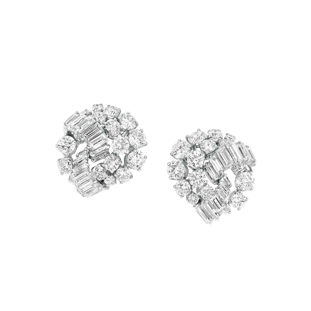 Appraisal: Pair of Platinum and Diamond Earclips Mauboussin The stylized knots