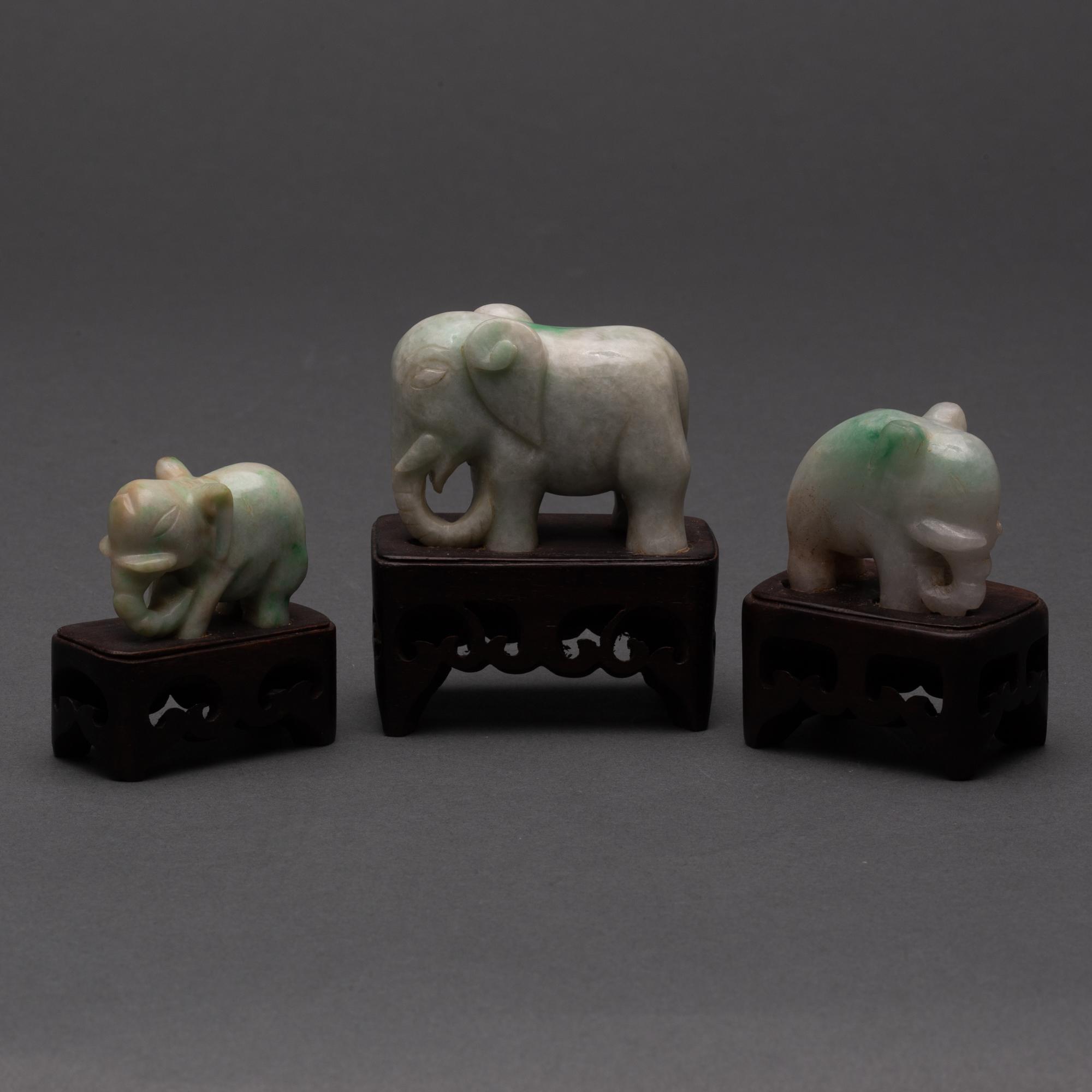 Appraisal: CARVED CHINESE CELADON JADEITE JADE ELEPHANTS TH CENTURY Three elephants