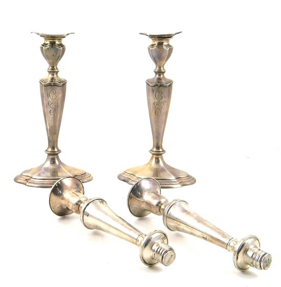 Appraisal: SILVER Two pairs of weighted sterling silver candlesticks one pair