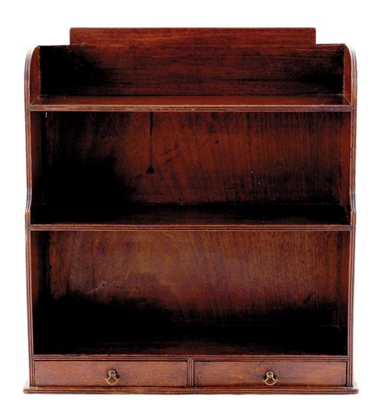 Appraisal: English mahogany tabletop bookcase late th century three enclosed shelves