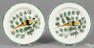 Appraisal: Pair of pearlware green feather edge plates with peafowl decoration