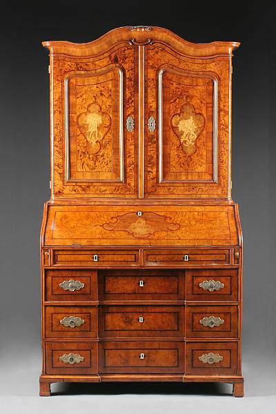 Appraisal: A Continental inlaid walnut and ash secretary cabinet fourth quarter