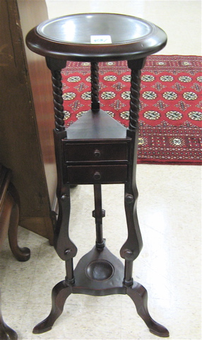 Appraisal: PAIR OF MAHOGANY PLANT STANDS each with circular dish top