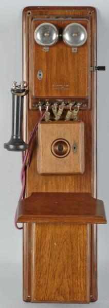 Appraisal: Western Electric Box Telephone Description Circa Walnut Blake transmitter is