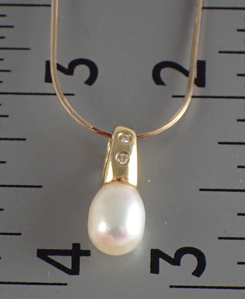 Appraisal: PEARL DIAMOND AND FOURTEEN KARAT GOLD PENDANT NECKLACE with an