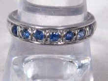 Appraisal: A carat white gold half eternity ring set with sapphires