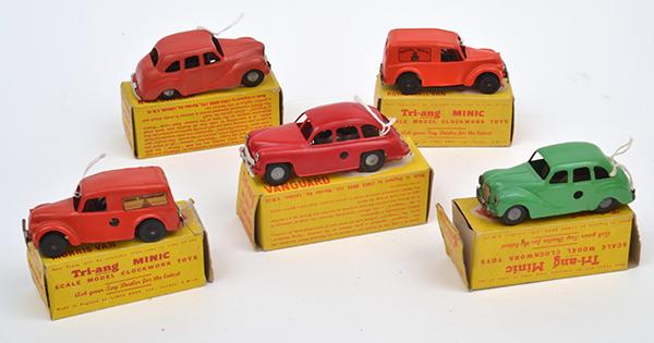 Appraisal: FIVE TRIANG CLOCKWORK PLASTIC MODELS INCLUDING X AUSTIN A SALOON