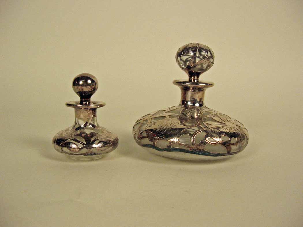 Appraisal: Two sterling silver overlay scent bottles early th century Of