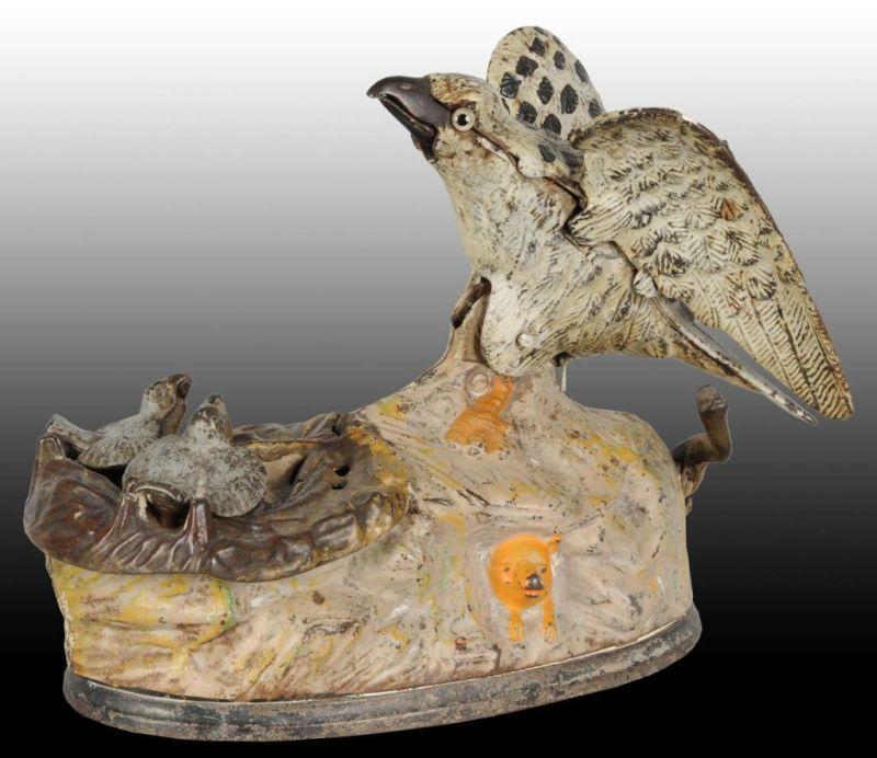 Appraisal: Cast Iron Eagle Eaglets Mechanical Bank Description Manufactured by J