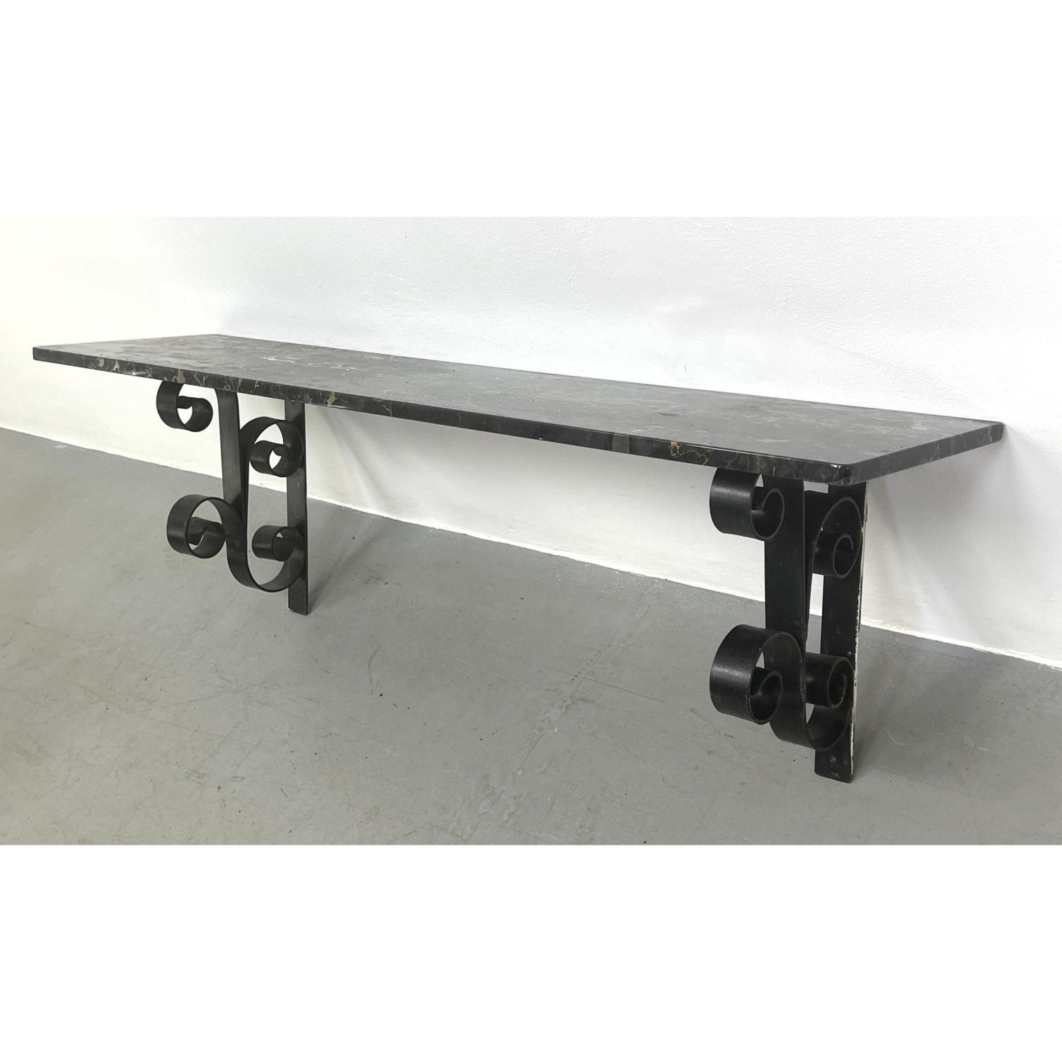 Appraisal: Black Marble Shelf on Wall Mounted Iron Base Sturdy Scroll