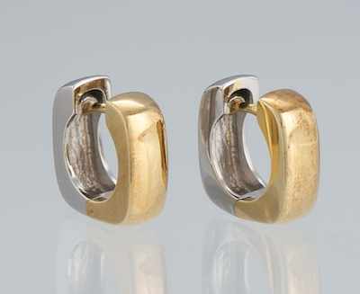 Appraisal: A Pair of Two Tone Gold Huggie Earrings k yellow