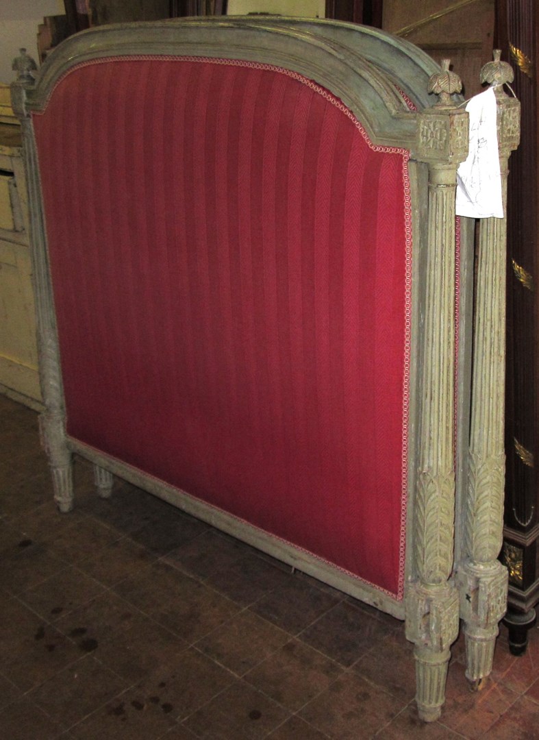 Appraisal: A th century French grey painted bed the arched head