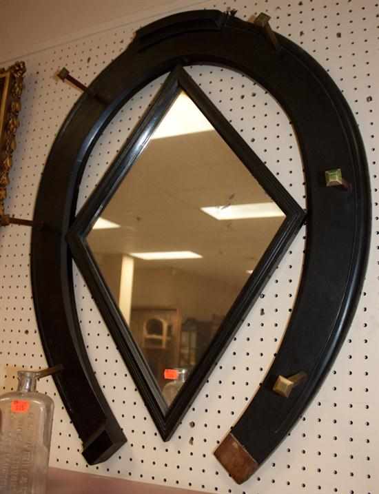 Appraisal: Ebonized wood horseshoe-form mirror and coat rack Estimate - No