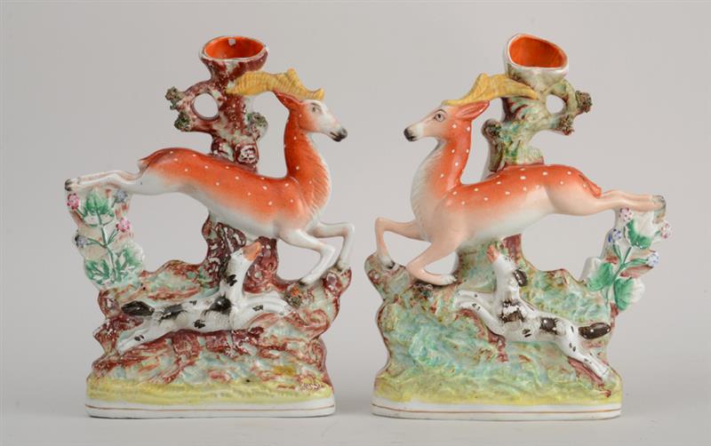 Appraisal: PAIR OF STAFFORDSHIRE RUNNING STAG AND HOUND VASES Each against