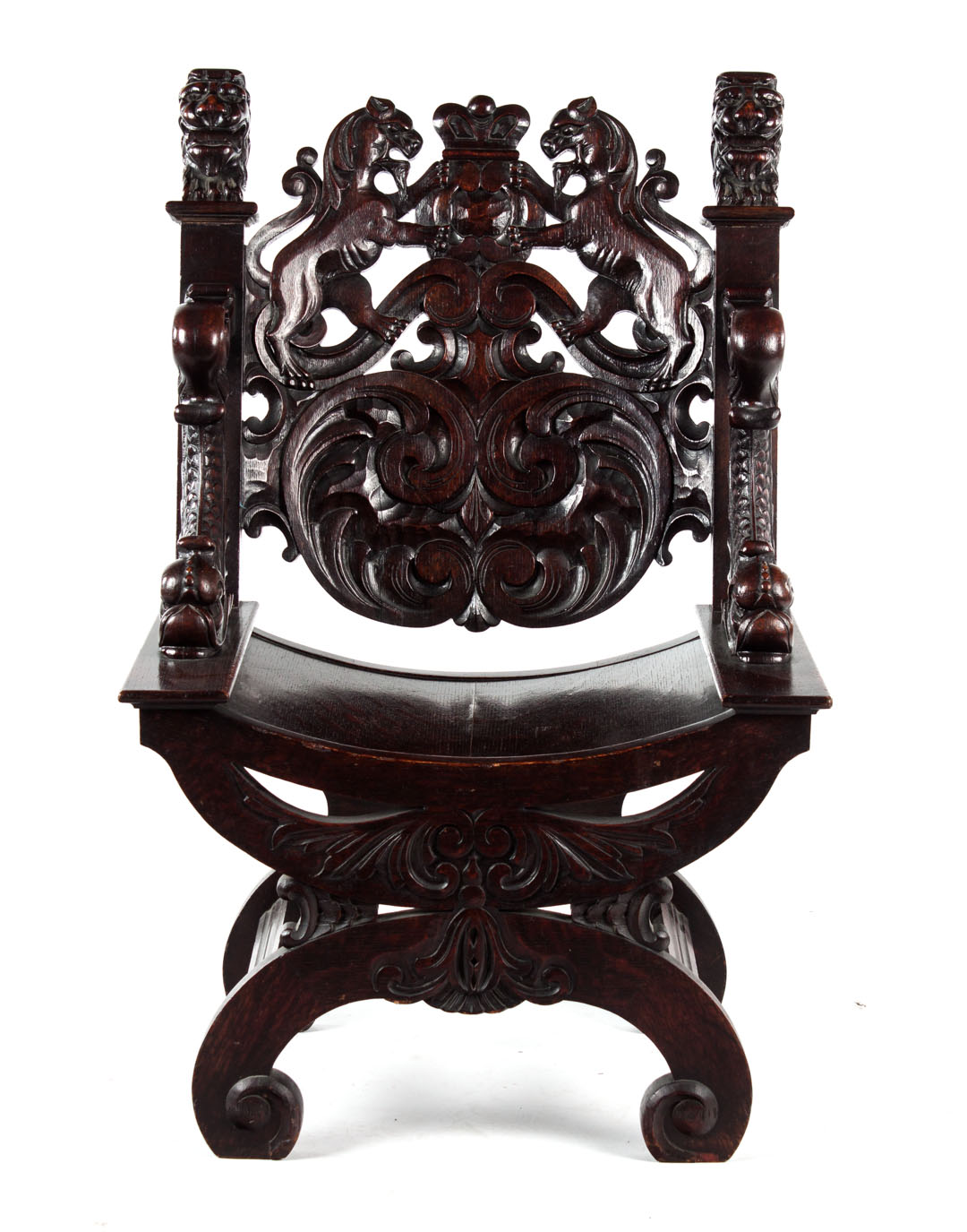 Appraisal: Renaissance Revival carved oak armorial armchair th century elaborately carved