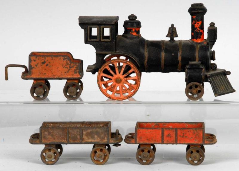 Appraisal: Cast Iron Carpenter Steam Freight Train Set Description Floor version