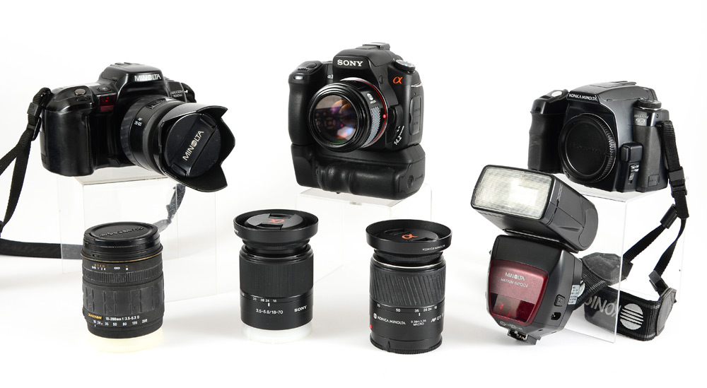 Appraisal: LARGE COLLECTION OF CAMERAS LENSES Lot to include Sony Alpha