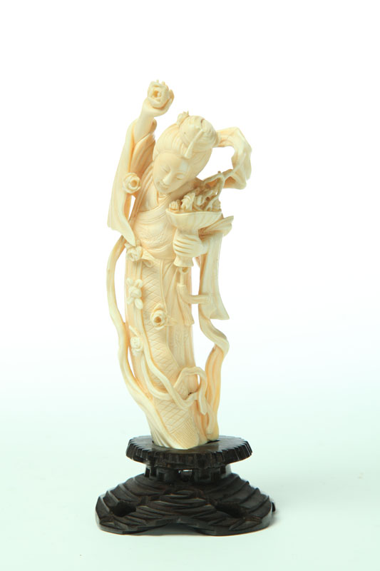 Appraisal: IVORY CARVING OF A WOMAN China st half- th century