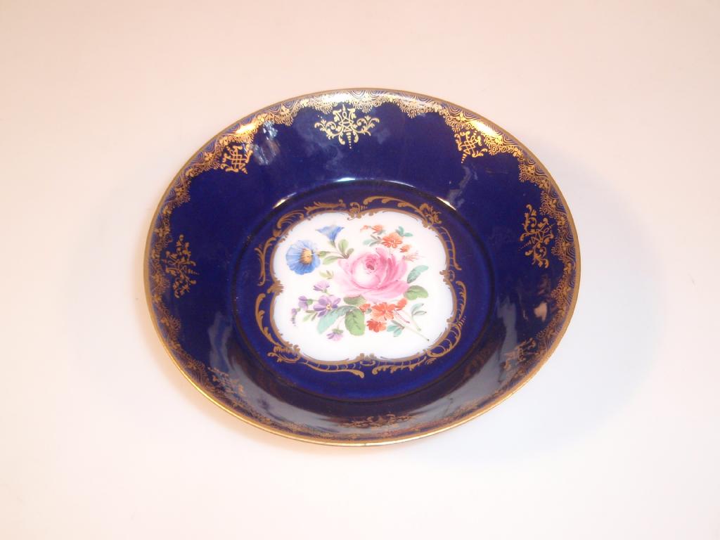 Appraisal: A Meissen dish circular with sloping sides painted with a