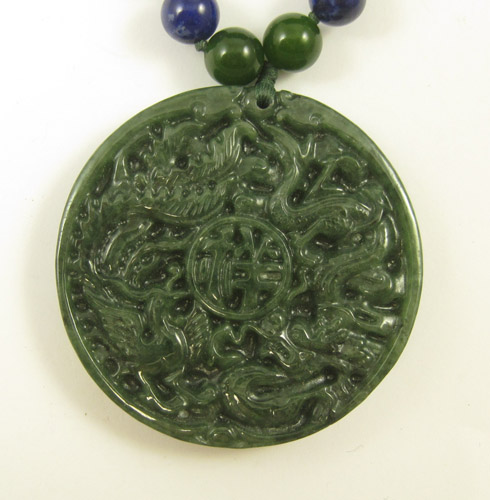 Appraisal: JADE AND LAPIS LAZULI PENDANT NECKLACE measuring - inches in