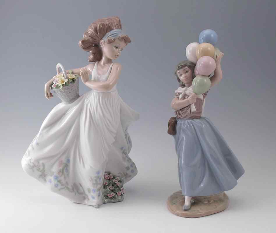 Appraisal: TWO LLADRO PORCELAIN FIGURINES To include BALLOONS FOR SALE glazed