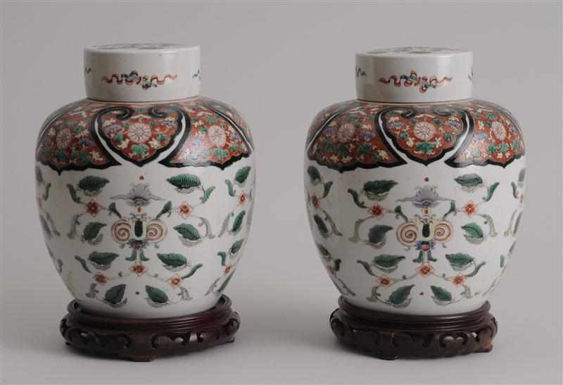 Appraisal: PAIR OF CHINESE FAMILLE VERTE STYLE PORCELAIN JARS AND COVERS